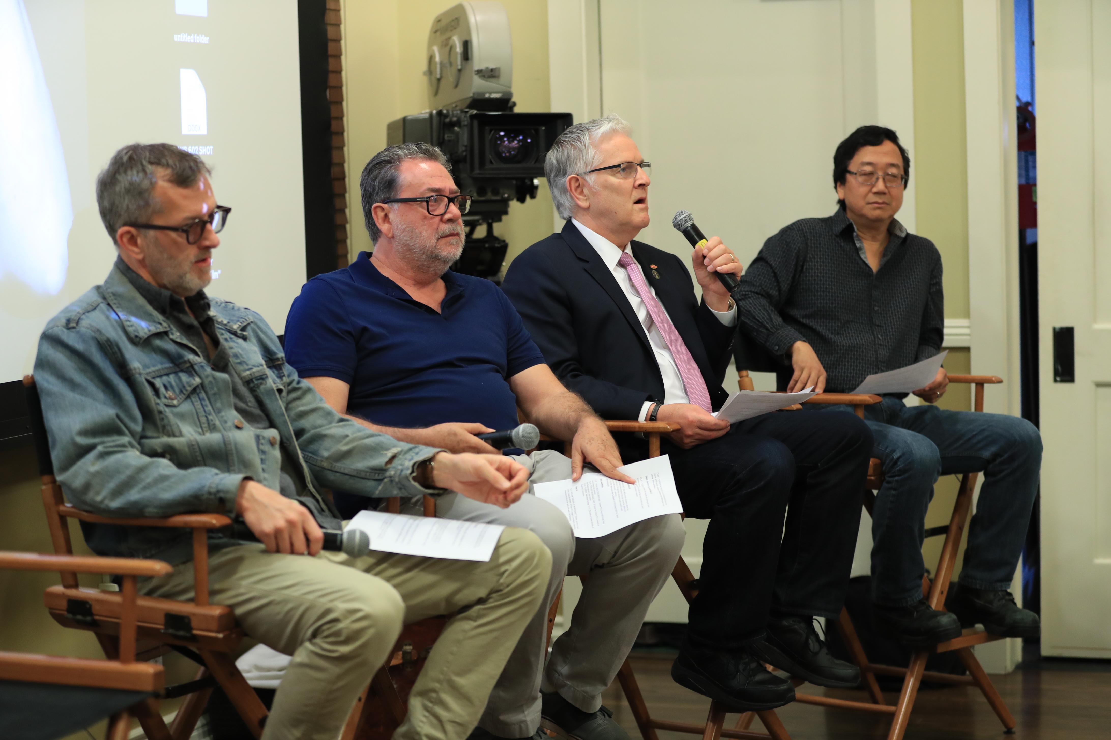At the ASC Clubhouse, IMAX Chief Quality Officer David Keighley introduces panelists (from left) Mark Worthington, Guillermo Navarro, ASC, AMC and Michael Goi, ASC. Photo by James Neihouse, ASC