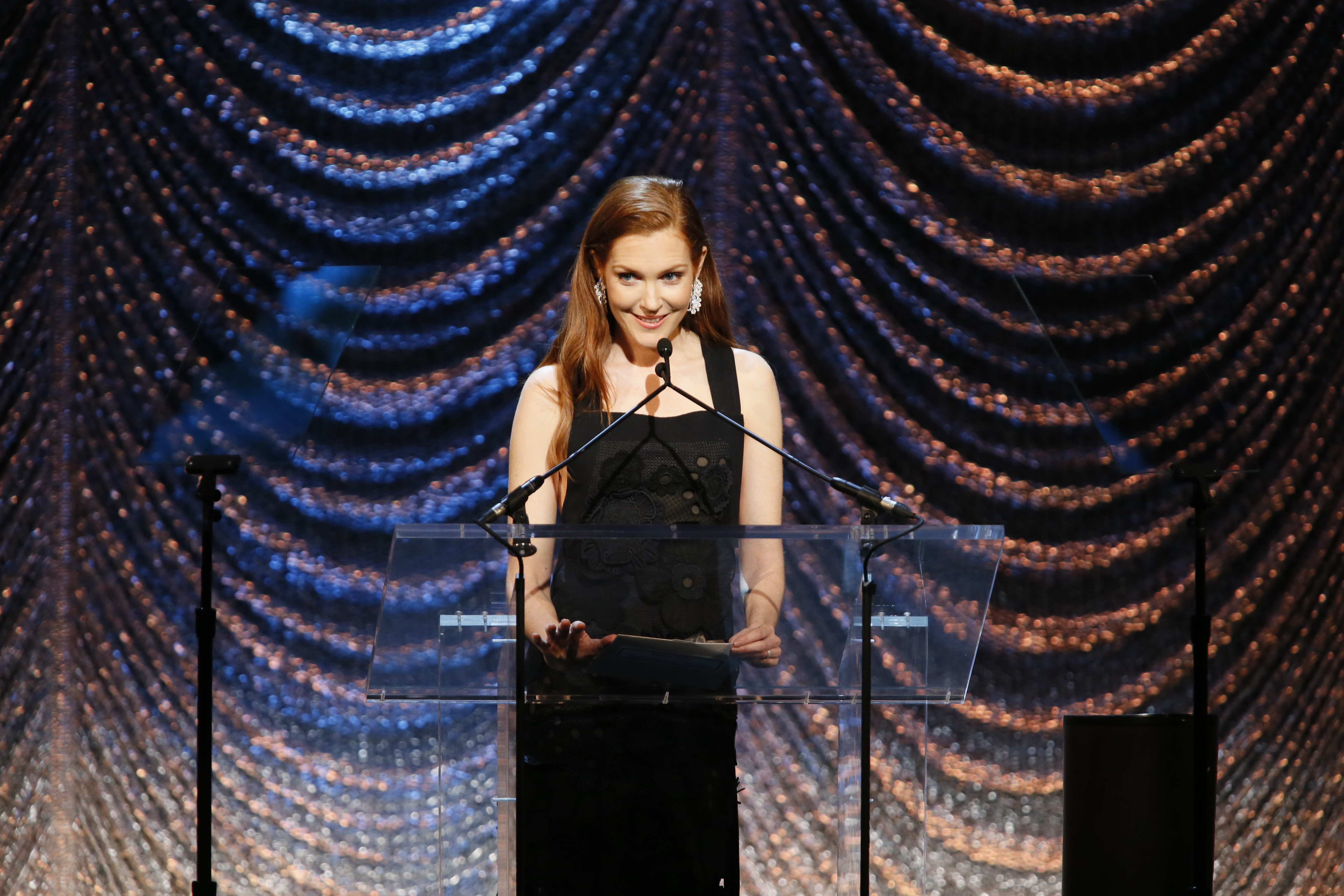 Presenter Darby Stanchfield announces the winner for Regular Series for Non-Commercial Television.