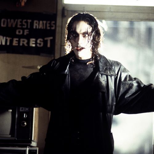 Eric Draven (Brandon Lee) makes his first public appearance as The Crow in a seedy pawnshop.