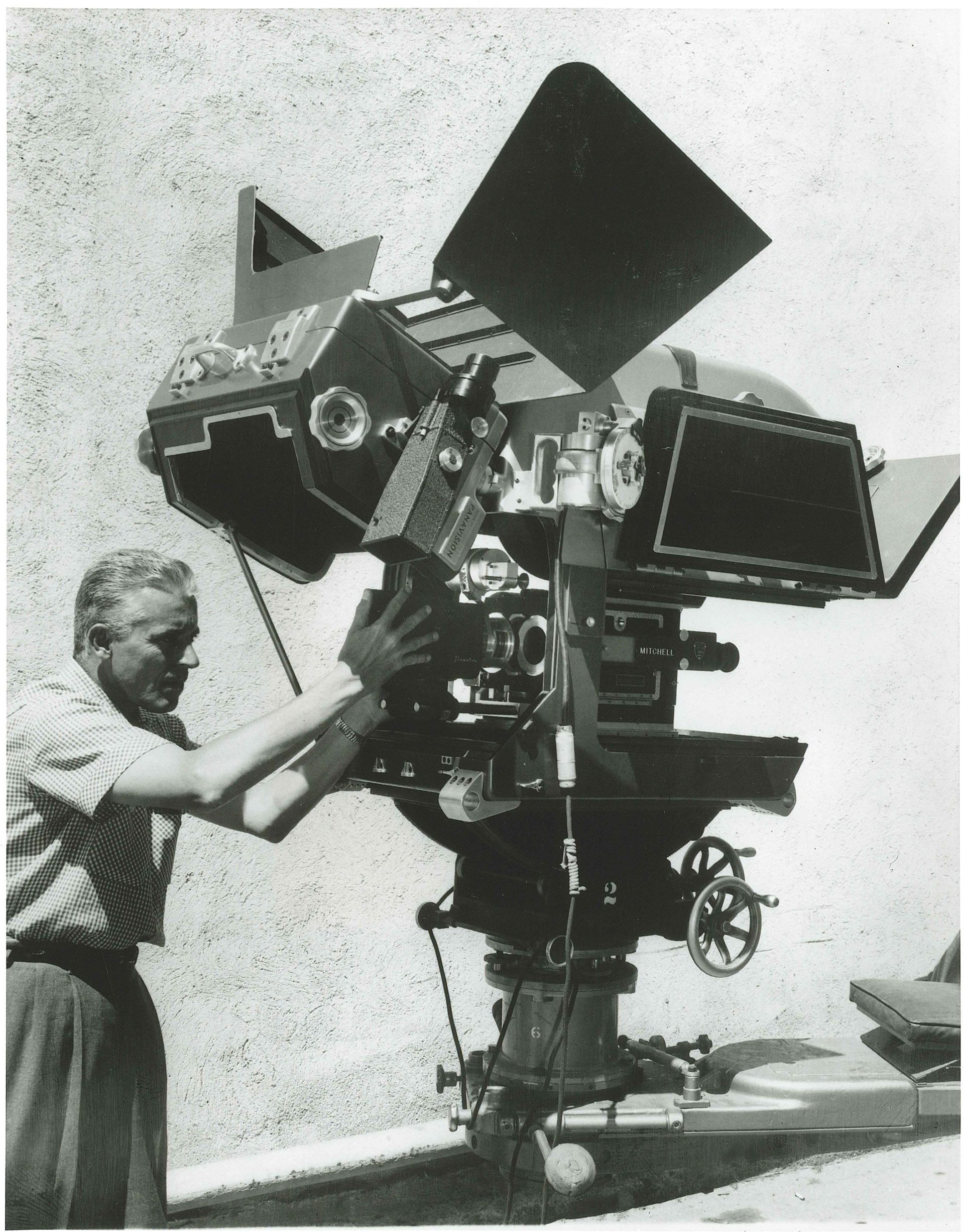 1957.-The-first-65mm-Panavision-camera-used-on-Ben-Hur.-The-assistant-is-mounting-an-Anamorphic-APO-Panatar-designed-for-Ultra-Panavision-70-MGM-Camera-65-credit-Panavision_67645e919b12432e590b303456de6e74.jpg