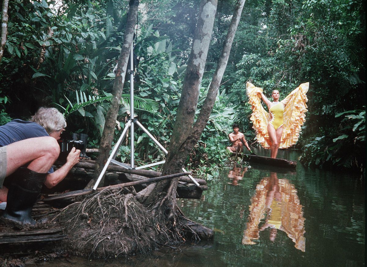 Kirkland shoots a 1991 fashion spread in the Amazon for Town & Country magazine.
