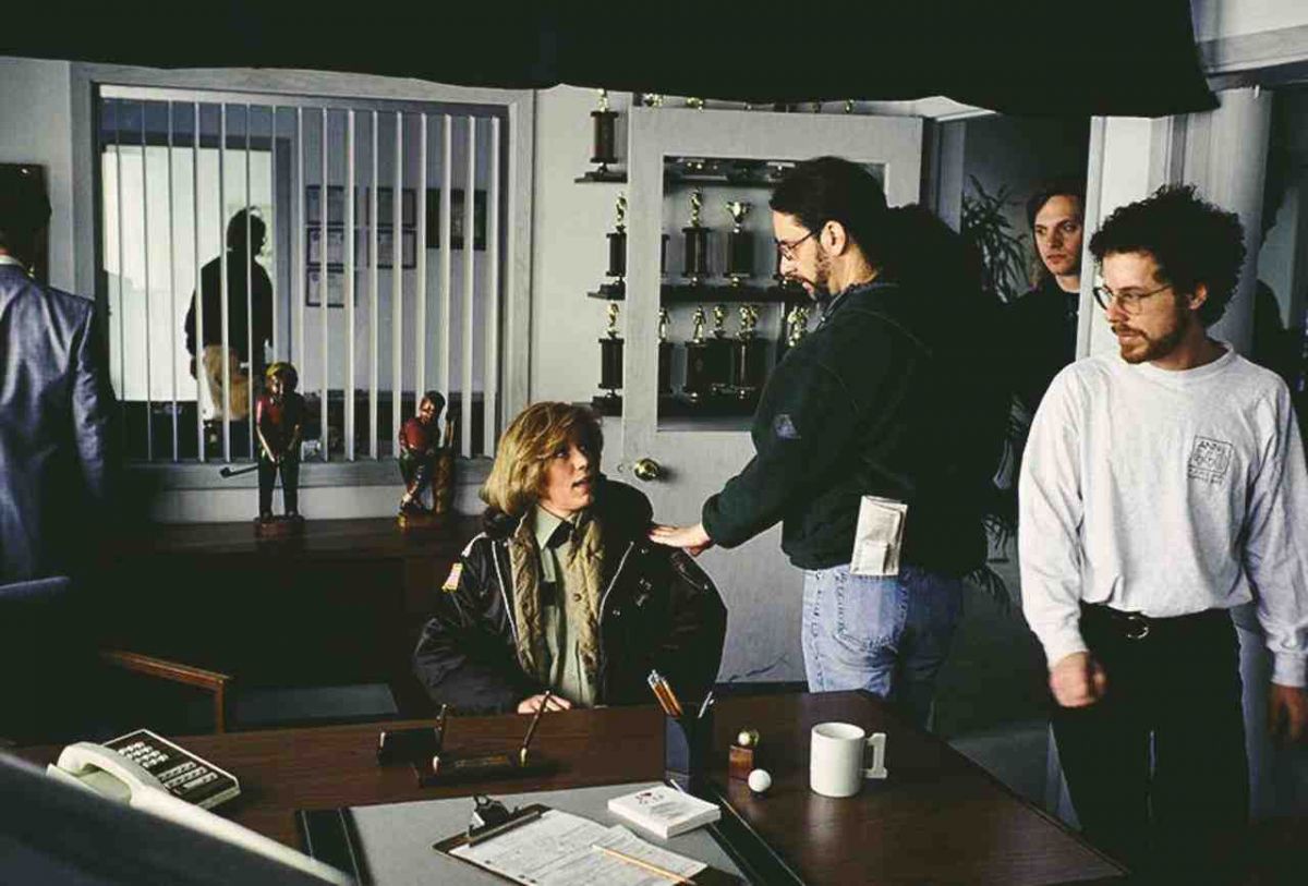 The Coens confer with actress Frances McDormand.