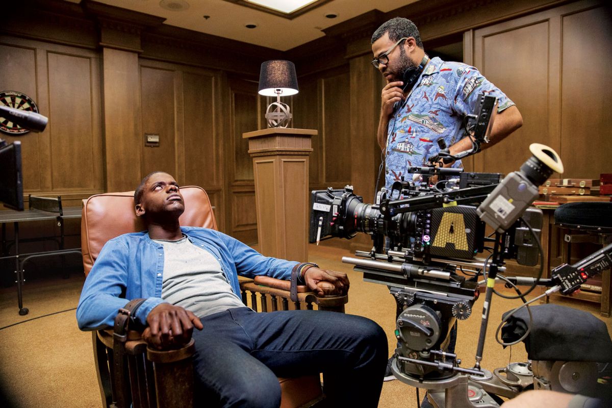 Director Jordan Peele confers with actor Daniel Kaluuya.