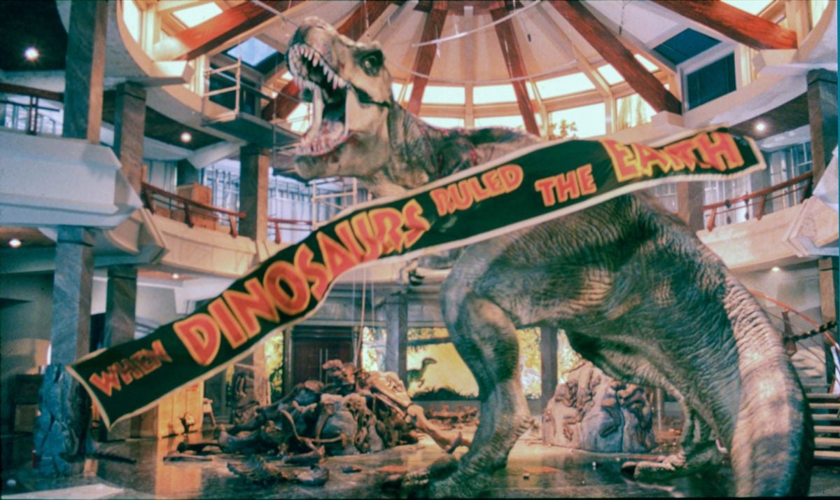 The revitalized T-rex demolishes the monument built to its predecessors. 