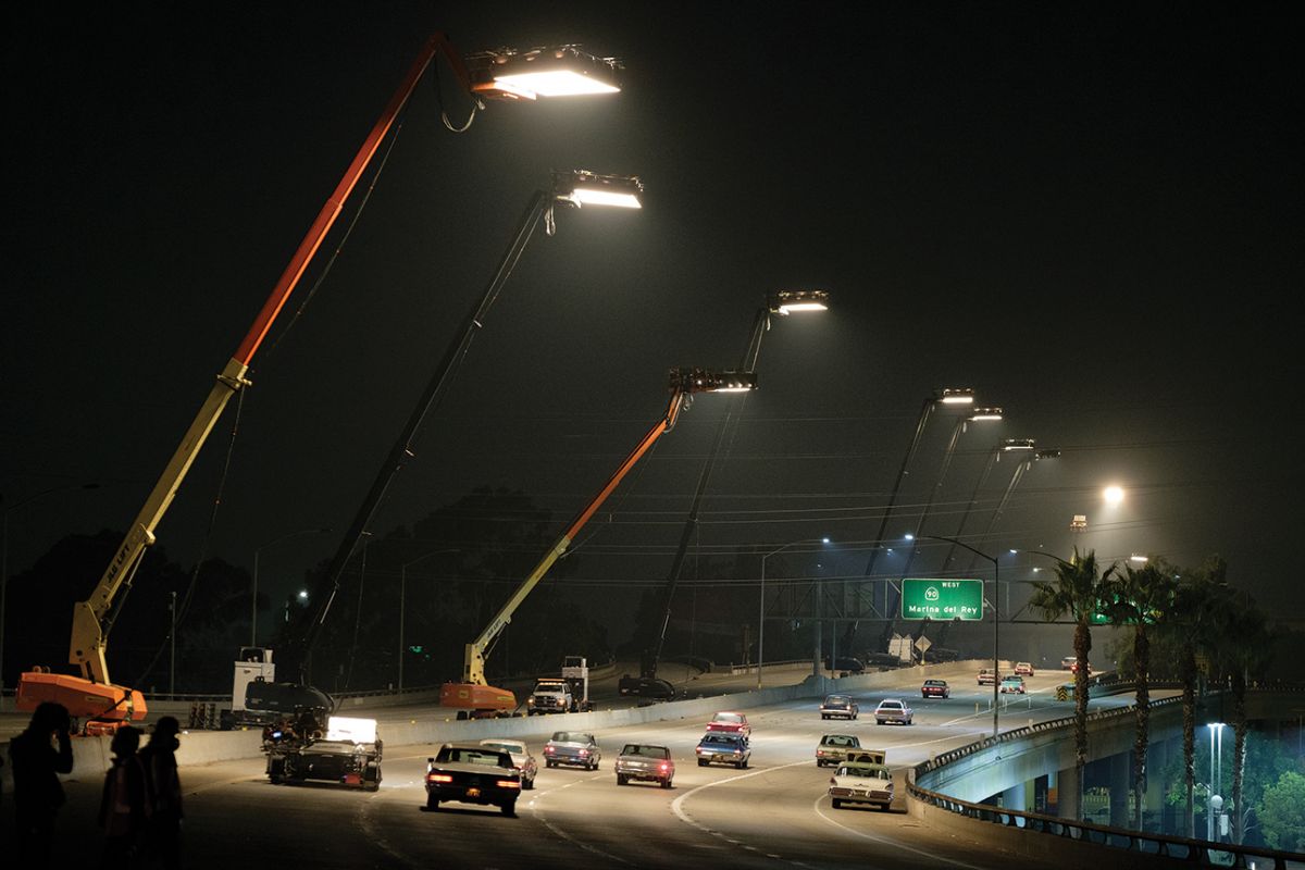 Nine 80' condors help to illuminate a stretch of freeway that the production closed down from dusk to dawn. 