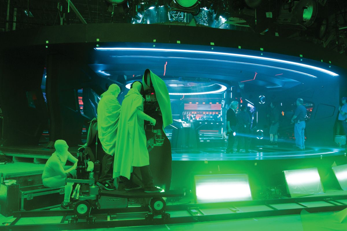 Shrouded in green, the camera crew readies an angle into the bridge. Other cameras were positioned within the bridge looking out toward this camera; later, visual-effects work made the open front of the set appear as the ship’s view screen.