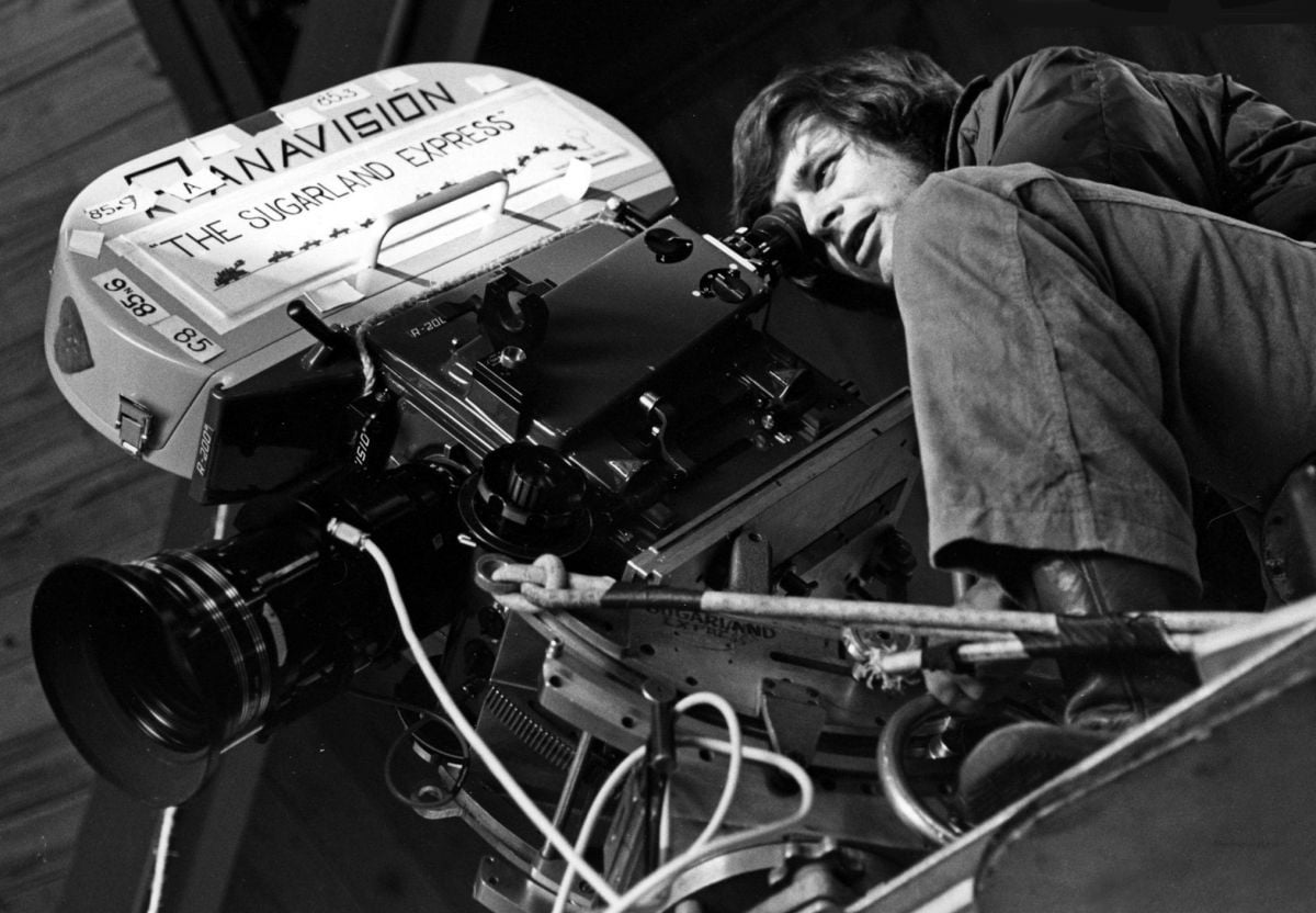 Spielberg takes a turn at the eyepiece on the Panavision R-200.
